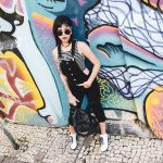 Black emo pants styling guide showcasing gothic alternative fashion outfit combinations and accessories